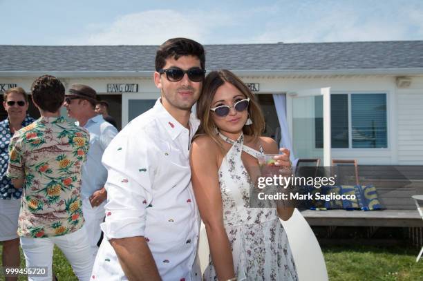 Teddy Nass and Nicki Friedman attend the Modern Luxury + The Next Wave at Breakers Montauk on July 14, 2018 in Montauk, New York.