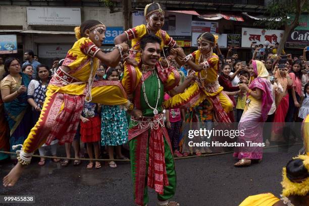 Artists perform in a Rath Yatra of Lord Jagannath organised by Jai Jagannath Loktaran Trust at Kharghar, on July 14, 2018 in Navi Mumbai, India. The...