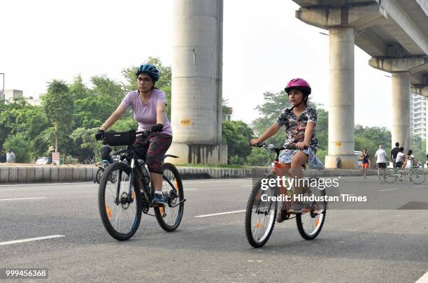 People take part in various activities conducted during Raahgiri Day, an event organised by MCG at Sector 55 Golf Course Road, on July 15, 2018 in...