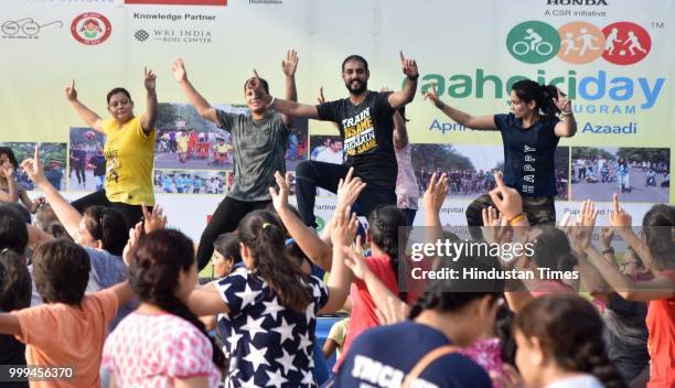 People take part in various activities conducted during Raahgiri Day, an event organised by MCG at Sector 55 Golf Course Road, on July 15, 2018 in...