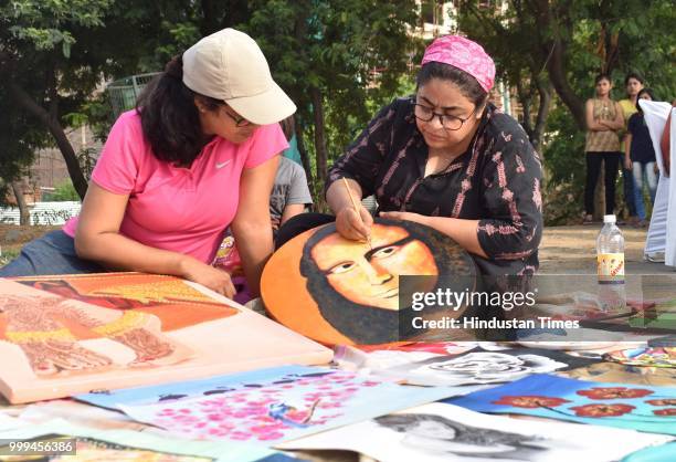 People take part in various activities conducted during Raahgiri Day, an event organised by MCG at Sector 55 Golf Course Road, on July 15, 2018 in...