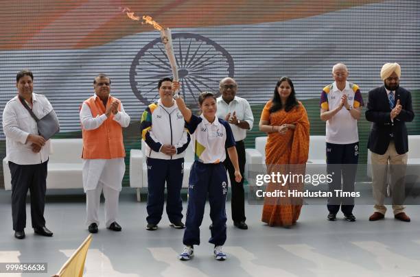 Indian boxer MC Mary Kom holds the torch as the 'Torch Relay' begins for the 18th Asian Games Jakarta Palembang 2018, after the flame - lighting...