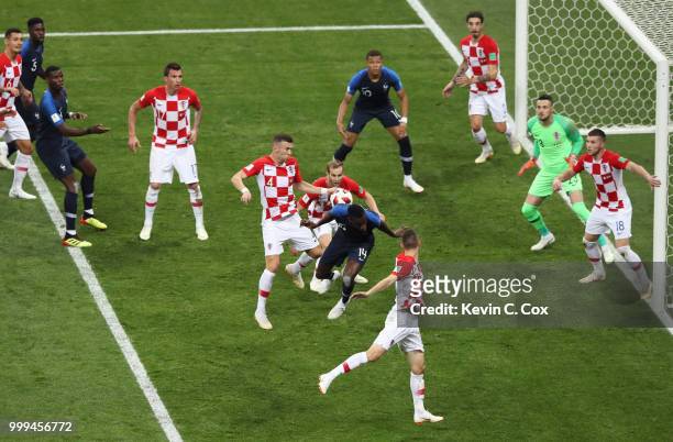 Ivan Perisic of Croatia handles the ball inside the penalty area, leading to a VAR review, and then a France penalty being awarded during the 2018...