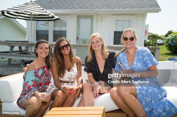 Charlotte LaGuardia, Aura Skerys, Sara Korwin and Shannon Novak attend the Modern Luxury + The Next Wave at Breakers Montauk on July 14, 2018 in...