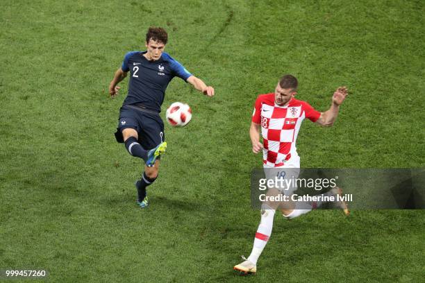 Benjamin Pavard of France and Ante Rebic of Croatia battle for the ball during the 2018 FIFA World Cup Final between France and Croatia at Luzhniki...