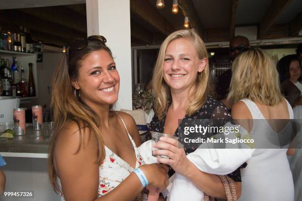 Aura Skerys and Sara Korwin attend the Modern Luxury + The Next Wave at Breakers Montauk on July 14, 2018 in Montauk, New York.