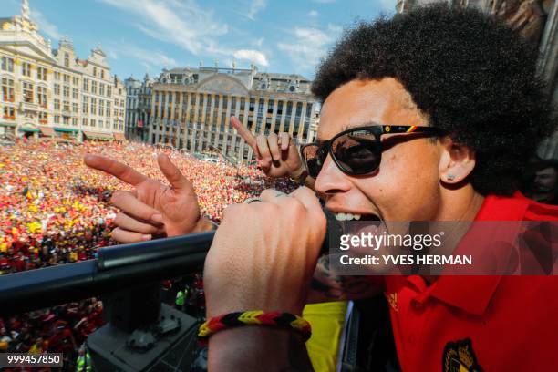 Belgium's Axel Witsel shouts on the microphone as he celebrates at the Grand Place/Grote Markt in Brussels city center, as Belgian national football...