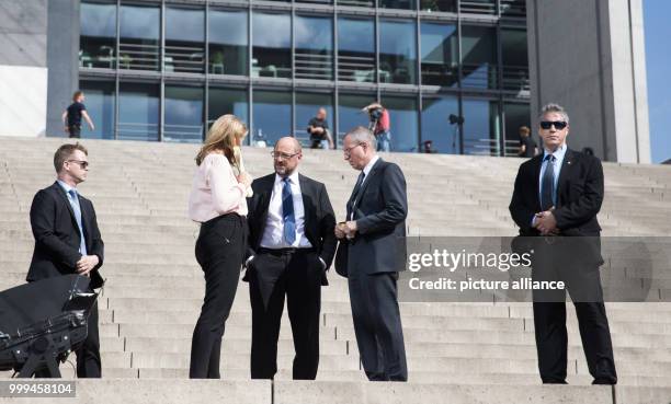 The Social Democratic Party of Germany's top candidate Martin Schulz talks to the presenters Tina Hassel and Thomas Baumann after the recording of...