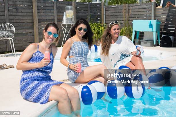 Martha Mosco, Gigi Stepanyan and Michelle Dutton attend the Modern Luxury + The Next Wave at Breakers Montauk on July 14, 2018 in Montauk, New York.