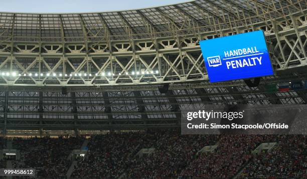 The stadium scoreboard displays the VAR decision during the 2018 FIFA World Cup Russia Final between France and Croatia at the Luzhniki Stadium on...