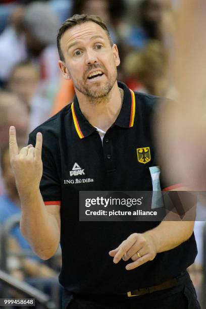 German head coach Chris Fleming shouting directions to his players during the Germany vs France match at the Mercedes-Benz Arena in Berlin, Germany,...