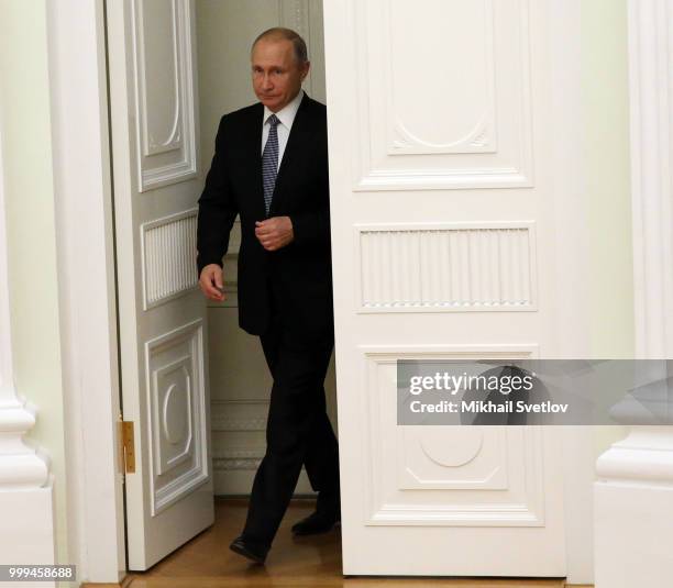 Russian President Vladimir Putin enters the hall prior to his meeting with Hungarian Prime Minister Viktor Orban at the Kremlin, in Moscow, Russia,...