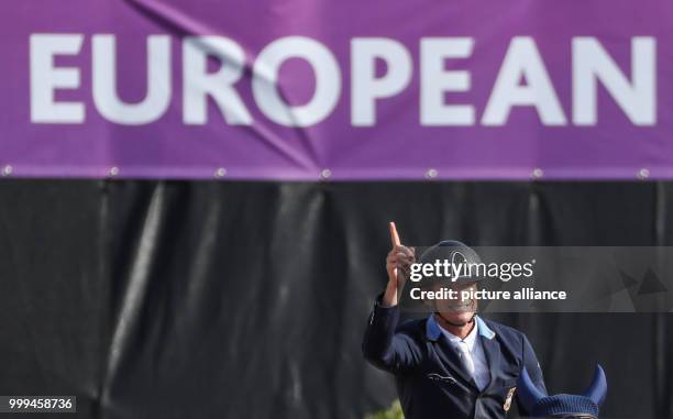 The Swedisch Show Jumper Peder Fredricson on horse H&M All In wins the gold medal in the single show jumping competition of the FEI European...