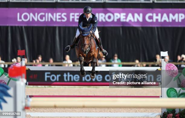 The Swedisch Show Jumper Peder Fredricson on horse H&M All In wins the gold medal in the single show jumping competition of the FEI European...