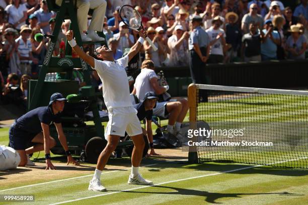Novak Djokovic of Serbia celebrates his victory over Kevin Anderson of South Africa after the Men's Singles final on day thirteen of the Wimbledon...