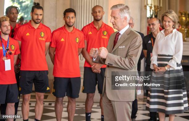 Queen Mathilde of Belgium and coach Roberto Martinez look at King Philip of Belgium welcoming the Red Devils, the Belgium international football team...