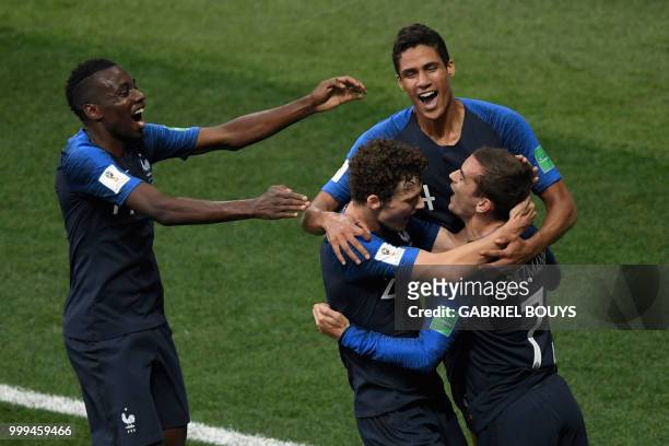 France's forward Antoine Griezmann, France's defender Benjamin Pavard, France's defender Raphael Varane and France's midfielder Blaise Matuidi...