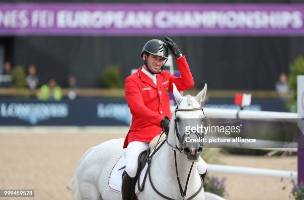 The German show jumper Philipp Weishaupt on horse LB Convall looks disappointed during the single show jumping competition of the FEI European...