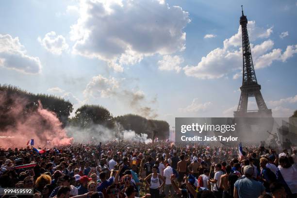 French football fans celebrate in the Champs-de-Mars fan zone as France score their first goal against Croatia in the FIFA 2018 World Cup Final match...