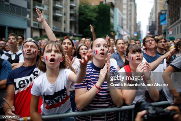 People watch the World Cup final soccer match between France and Croatia on July 15, 2018 in New York City. France is seeking its second World Cup...