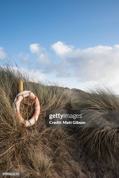 beautiful landscape image of freshwater west beach with sand dun - dun stock pictures, royalty-free photos & images