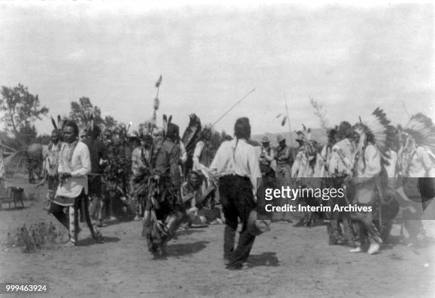 View of a war dance on Crow Agency, Montana, circa 1905.