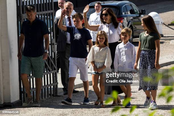 The Crown Prince family walks to the gate of Graasten Castle where they greets the Tilting-At-The-Ring Riders Event at Graasten Castle at Graasten on...