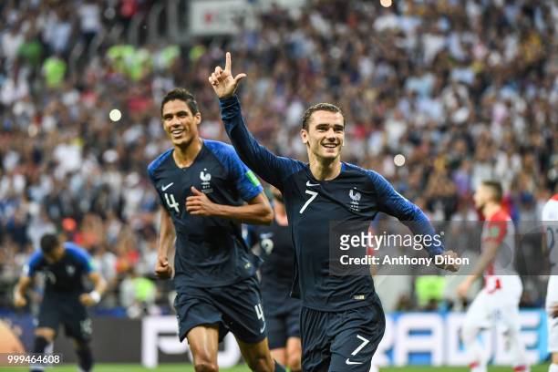 Raphael Varane and Antoine Griezmann of France celebrate a goal during the World Cup Final match between France and Croatia at Luzhniki Stadium on...