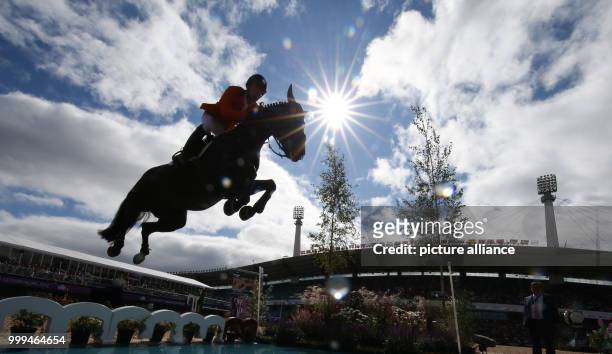 Netherland's show jumper Jur Vrieling on horse Glasgow v. Merelsnest in action during the single show jumping competition of the FEI European...