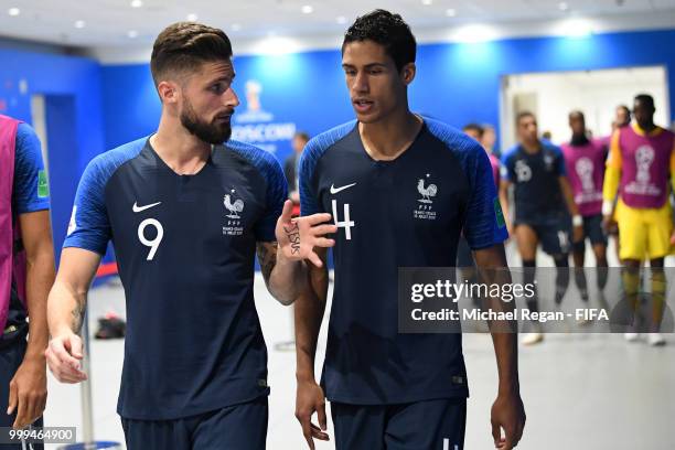 Olivier Giroud and Raphael Varane of France make their way to the pitch for second half during the 2018 FIFA World Cup Final between France and...