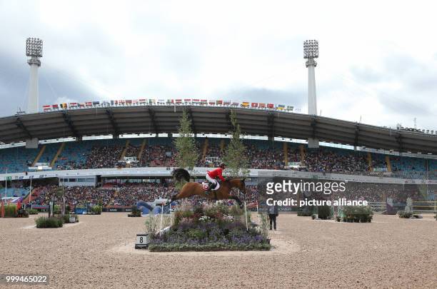 Switzerland's show jumper Steve Guerdat on horse Bianca in action during the single show jumping competition of the FEI European Championships 2017...