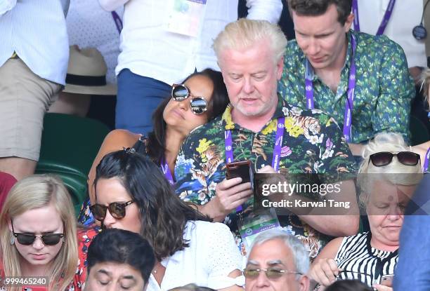 Natasha Shishmanian and Chris Evans attend the men's singles final on day thirteen of the Wimbledon Tennis Championships at the All England Lawn...