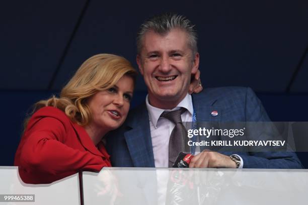 Croatian President Kolinda Grabar-Kitarovic and former Croatia's player Davor Suker attend the Russia 2018 World Cup final football match between...