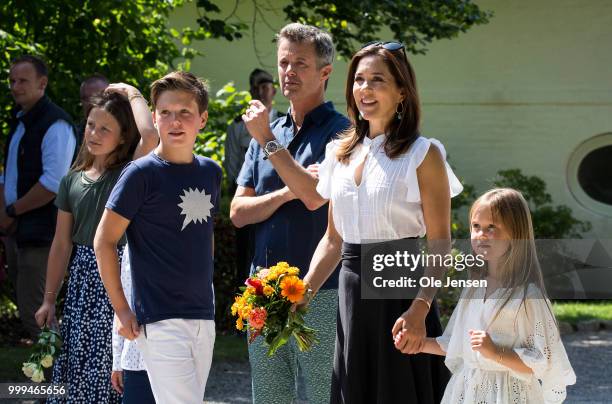 The Crown Prince family seen at the gate of Graasten Castle where they greets the Tilting-At-The-Ring Riders Event at Graasten Castle at Graasten on...