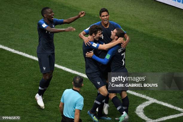 France's forward Antoine Griezmann, France's defender Benjamin Pavard, France's defender Raphael Varane and France's midfielder Blaise Matuidi...