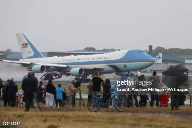 People watch as Air Force One takes off from Prestwick Airport in Ayrshire, as US President Donald Trump and his wife Melania leave the UK , after...