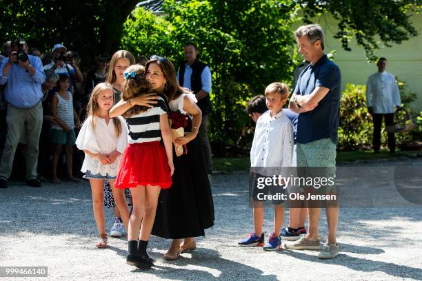 Crown Princess Mary of Denmark receives a flower bouquet during the Tilting-At-The-Ring Riders Event at Graasten Castle at Graasten on July 15, 2018...