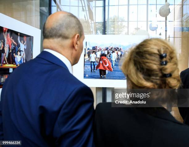 People visit photography exhibition, organized with the photographs from Turkey's Anadolu Agency about the July 15th failed coup attempt in Turkey,...