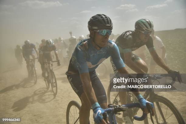 Spain's Mikel Landa rides through a cobblestone section after falling during the ninth stage of the 105th edition of the Tour de France cycling race...