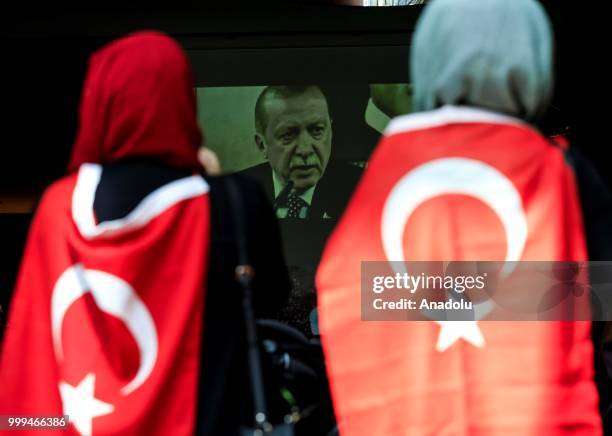 People attend a ceremony during the July 15 Democracy and National Unity Day to mark July 15 defeated coup's 2nd anniversary at Turkish Embassy in...