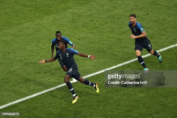 Paul Pogba of France celebrates after scoring his side's third goal, with team mates Blaise Matuidi and Olivier Giroud during the 2018 FIFA World Cup...