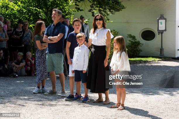 The Crown Prince family seen at the gate of Graasten Castle where they greets the Tilting-At-The-Ring Riders Event at Graasten Castle at Graasten on...