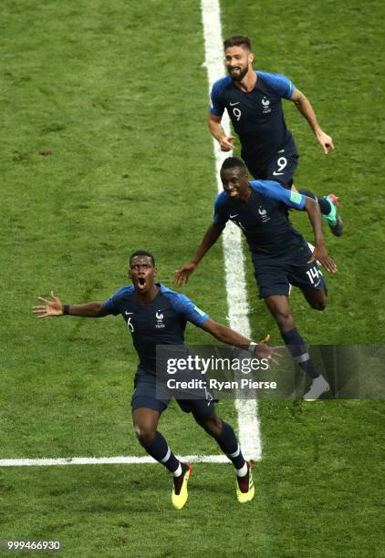 Paul Pogba of France celebrates with team mates after scoring his team's second goal during the 2018 FIFA World Cup Final between France and Croatia...