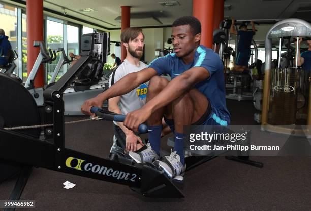 Athletic trainer Hendrik Vieth and Javairo Dilrosun of Hertha BSC during the training camp at Volkspark-Stadion on July 15, 2018 in Neuruppin,...
