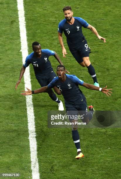 Paul Pogba of France celebrates with team mates after scoring his team's second goal during the 2018 FIFA World Cup Final between France and Croatia...