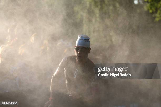 Athletes exit the water during Ironman UK on July 15, 2018 in Bolton, England.