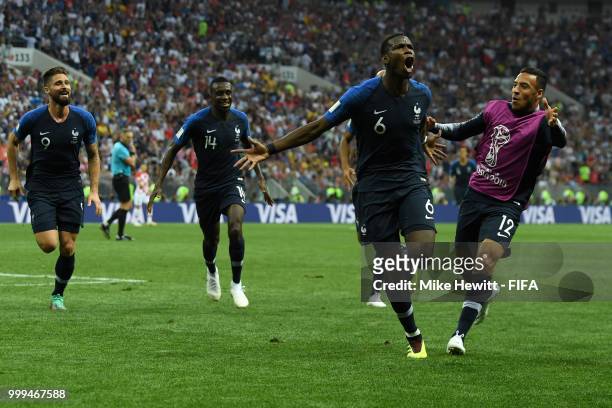 Paul Pogba of France celebrates after scoring his team's third goal with team mates during the 2018 FIFA World Cup Final between France and Croatia...