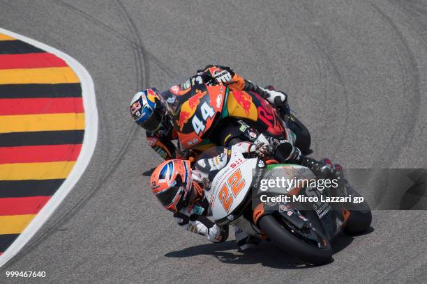 Sam Lowes of Great Britain and Swiss Innovative Investors leads Miguel Oliveira of Portugal and Red Bull KTM Ajo during the Moto2 race during the...