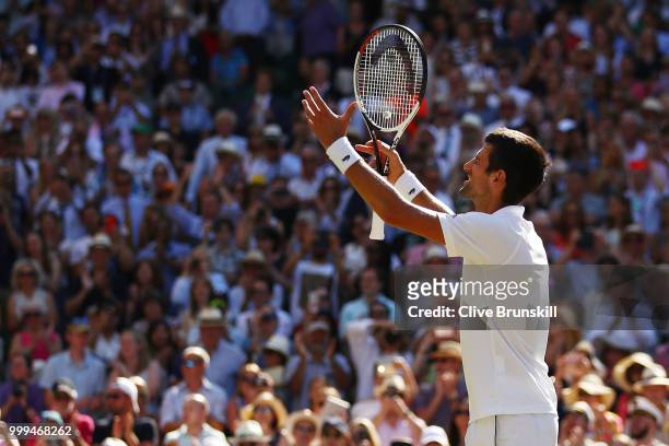 Novak Djokovic of Serbia celebrates his victory over Kevin Anderson of South Africa after the Men's Singles final on day thirteen of the Wimbledon...