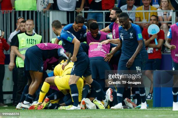Paul Pogba of France celebrates with team mates after scoring his team's third goal during the 2018 FIFA World Cup Russia Final between France and...